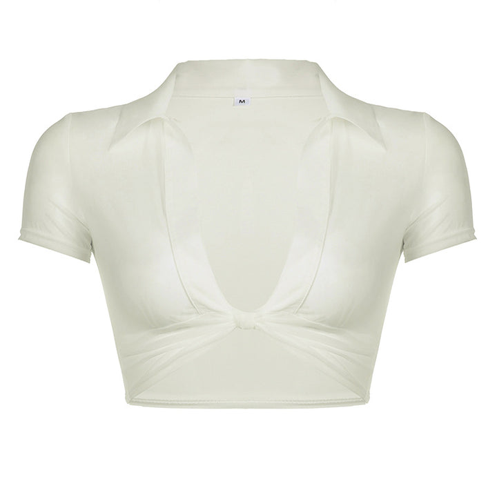 Damen cropped topp med knutdesign och djup V-ringning Mirla-Eva Jonsson