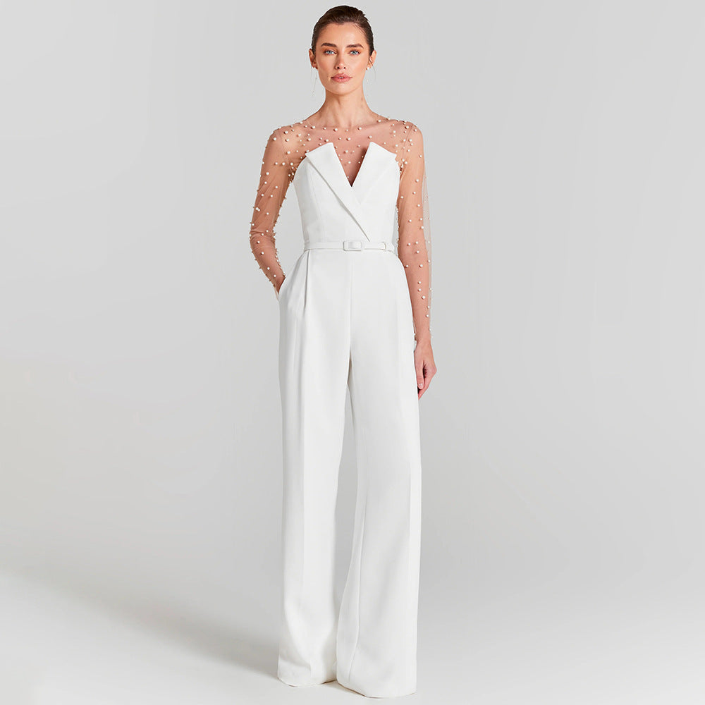 Damen elegant jumpsuit med genomskinliga ärmar och pärlprydnad Mirla-Eva Jonsson