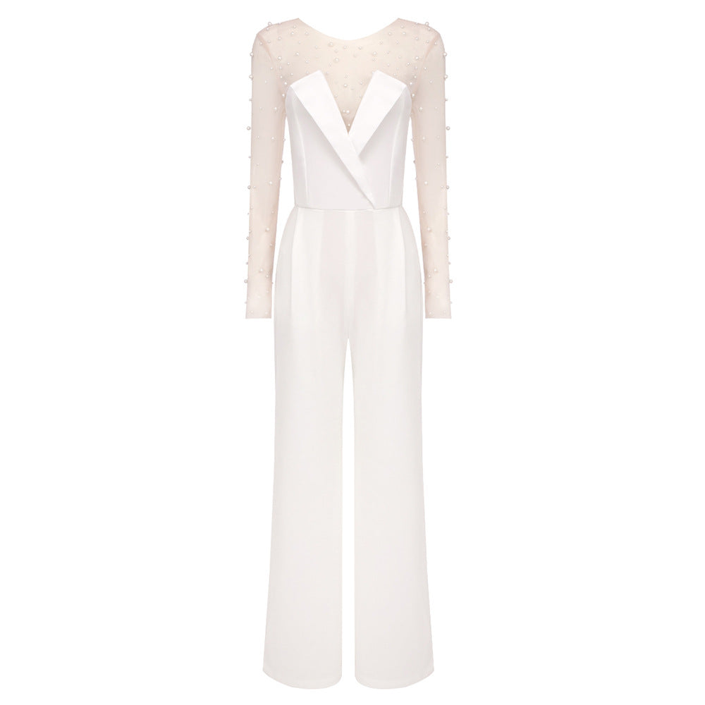 Damen elegant jumpsuit med genomskinliga ärmar och pärlprydnad Mirla-Eva Jonsson