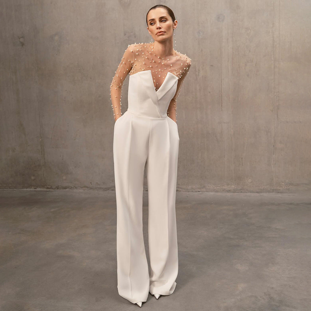 Damen elegant jumpsuit med genomskinliga ärmar och pärlprydnad Mirla-Eva Jonsson