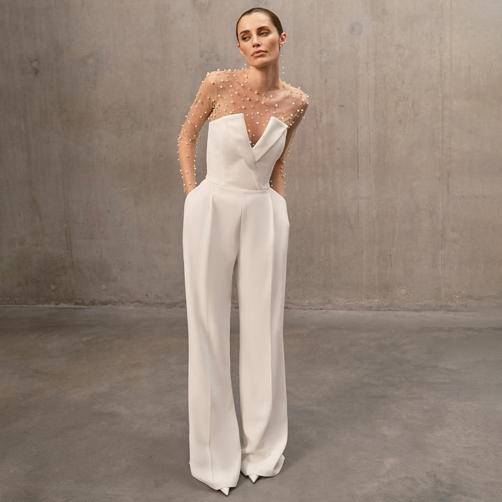 Damen elegant jumpsuit med genomskinliga ärmar och pärlprydnad Mirla-Eva Jonsson