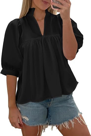 Damen elegant kortärmad blus med volangdetaljer och avslappnad passform Mirla-Eva Jonsson