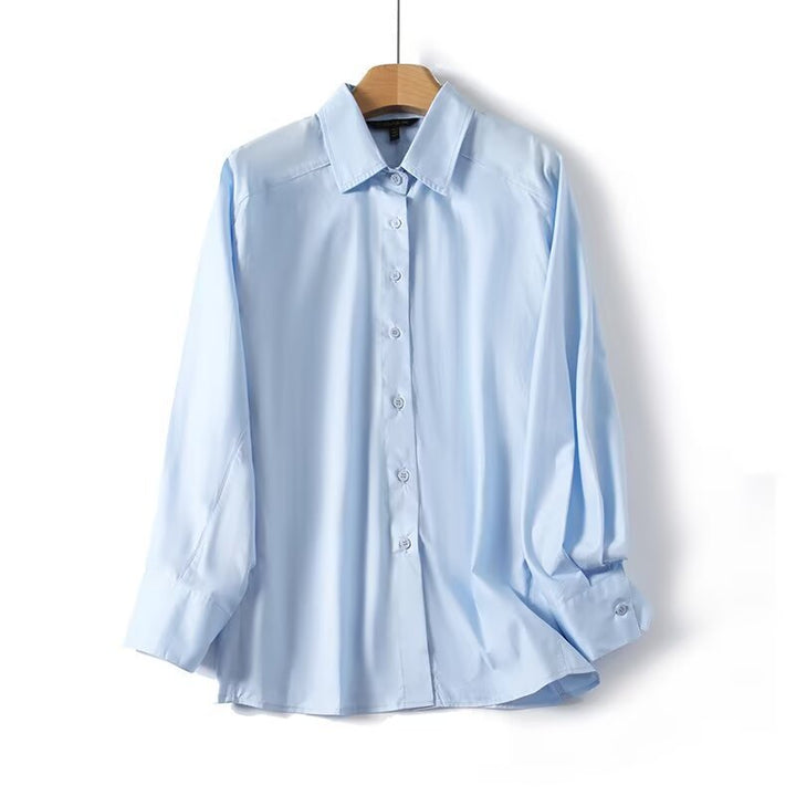 Damen elegant långärmad blus med moderna detaljer och strukturerad tyg Mirla-Eva Jonsson