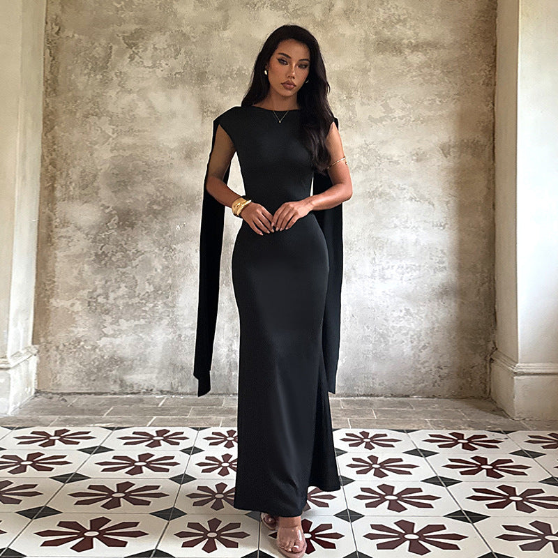Damen elegant maxiklänning med raffinerade ärmdetaljer och flytande silhuett Mirla-Eva Jonsson