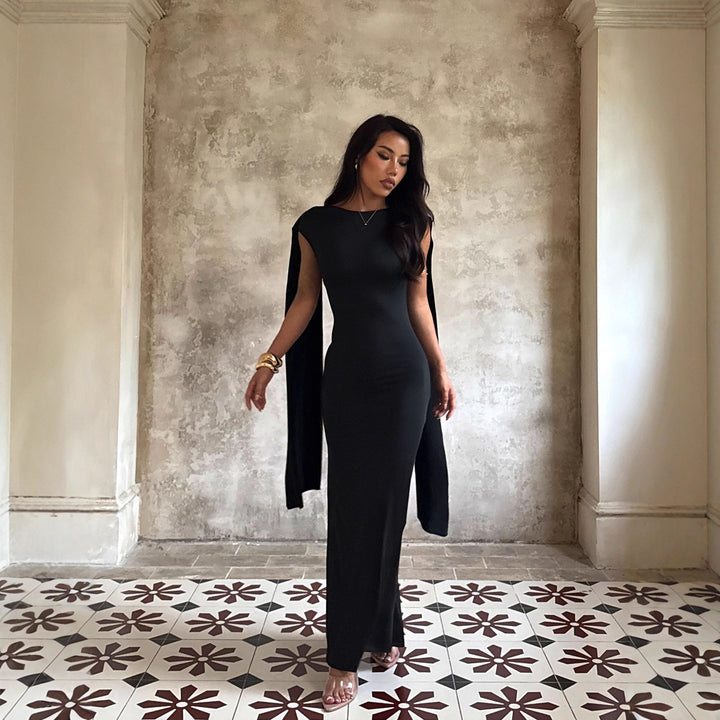 Damen elegant maxiklänning med raffinerade ärmdetaljer och flytande silhuett Mirla-Eva Jonsson
