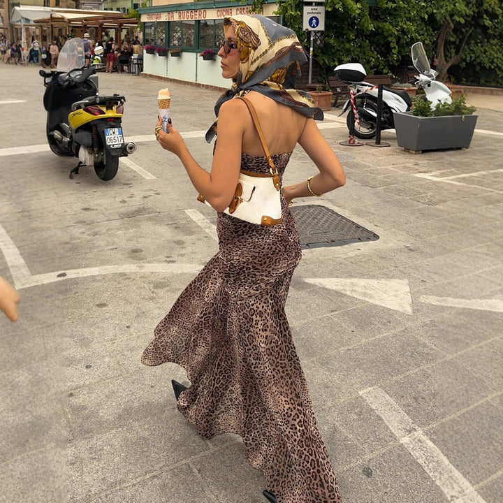Damen elegant wrap dress with leopard print and voluminous hem Mirla-Eva Jonsson