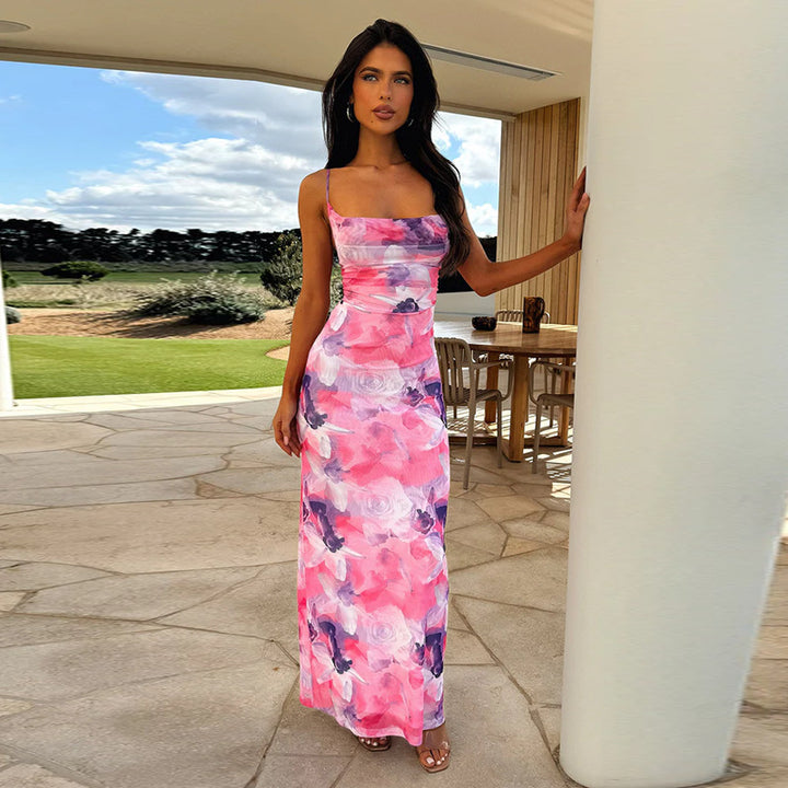 Damen eleganta långärmad maxiklänning med blommönster och smal silhuett Mirla-Eva Jonsson