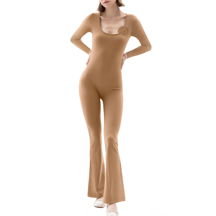 Damen figurbetonande jumpsuit med långa ärmar och skulpturdetaljer Mirla-Eva Jonsson