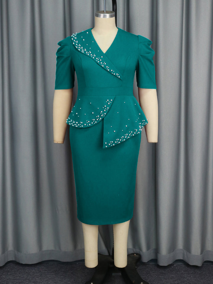 Damen figursydd Wickelkleid med volanger och pärlaccent Mirla-Eva Jonsson