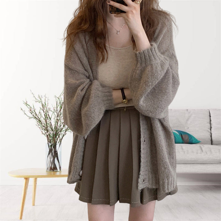 Damen gemütliche Strickjacke mit voluminösen Ärmeln Mirla-Eva Jonsson