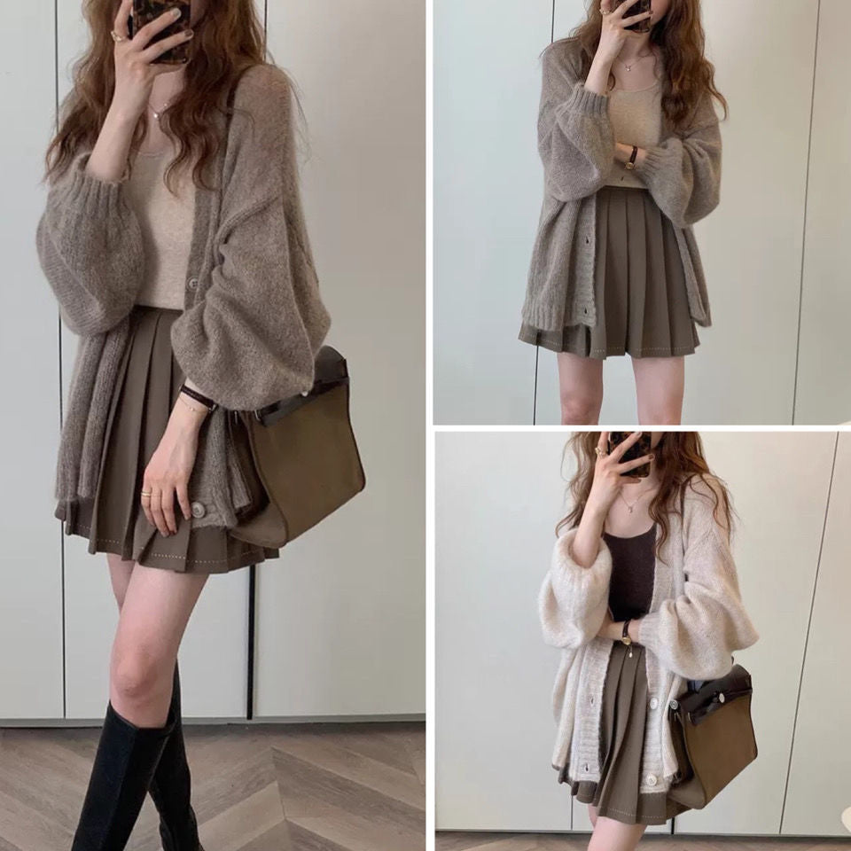 Damen gemütliche Strickjacke mit voluminösen Ärmeln Mirla-Eva Jonsson