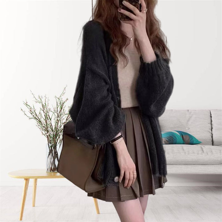 Damen gemütliche Strickjacke mit voluminösen Ärmeln Mirla-Eva Jonsson