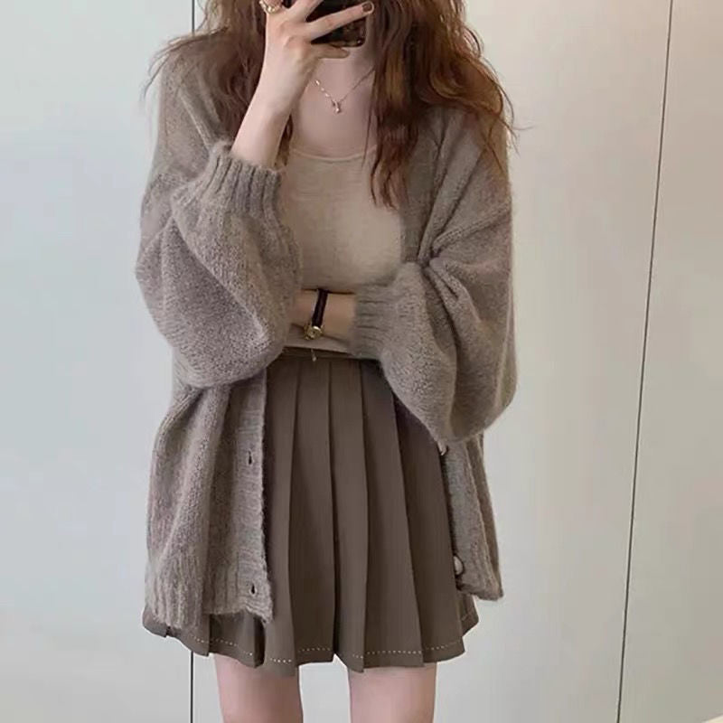 Damen gemütliche Strickjacke mit voluminösen Ärmeln Mirla-Eva Jonsson