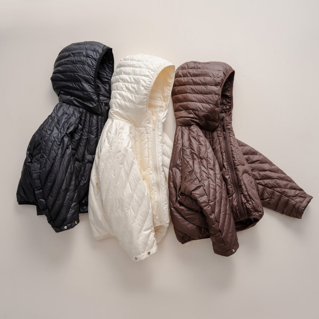 Damen gesteppte Jacke mit Kapuze und trendigem Design Mirla-Eva Jonsson