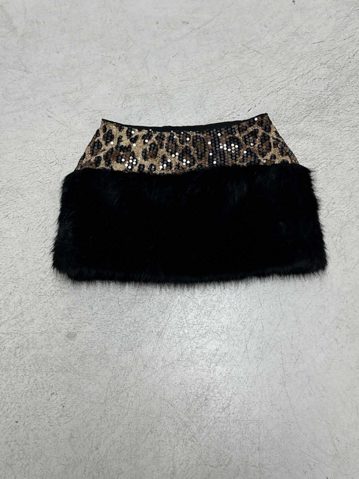 Damen glittrande leopardmönster topp med fuskpälsdetaljer Mirla-Eva Jonsson