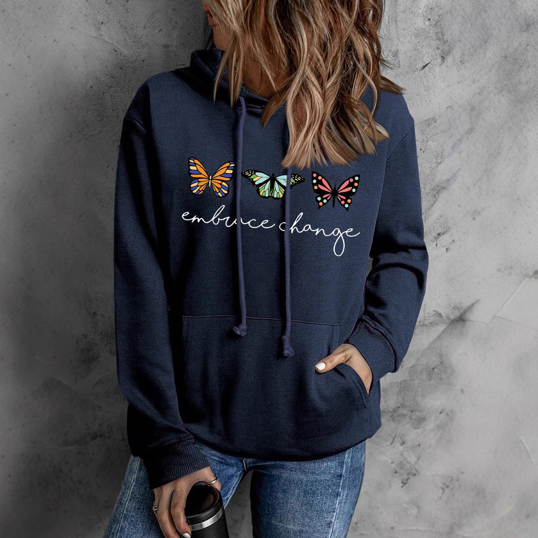 Damen hoodies med inspirerande fjärilsmotiv och motivationsbudskap Mirla-Eva Jonsson