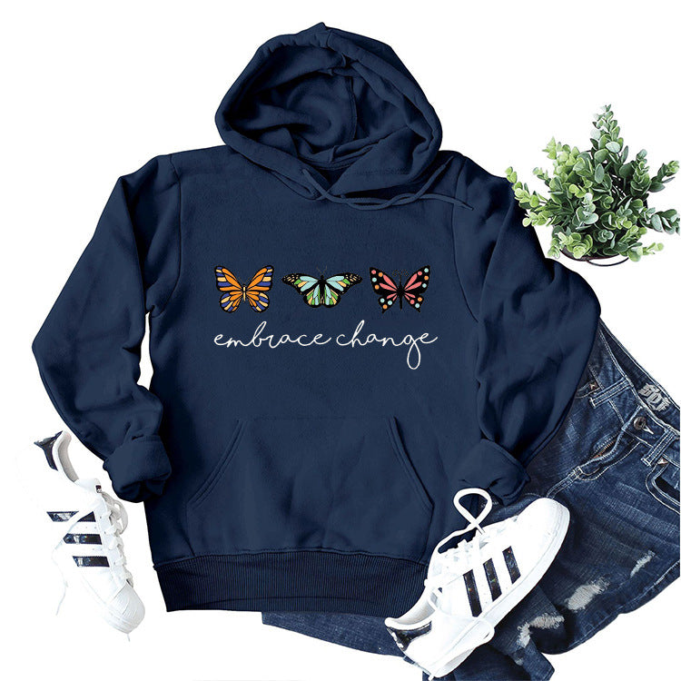 Damen hoodies med inspirerande fjärilsmotiv och motivationsbudskap Mirla-Eva Jonsson