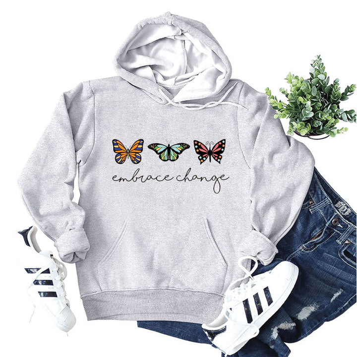 Damen hoodies med inspirerande fjärilsmotiv och motivationsbudskap Mirla-Eva Jonsson