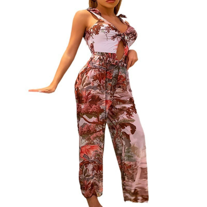 Damen jumpsuit med blommönster och öppen ryggparti Mirla-Eva Jonsson