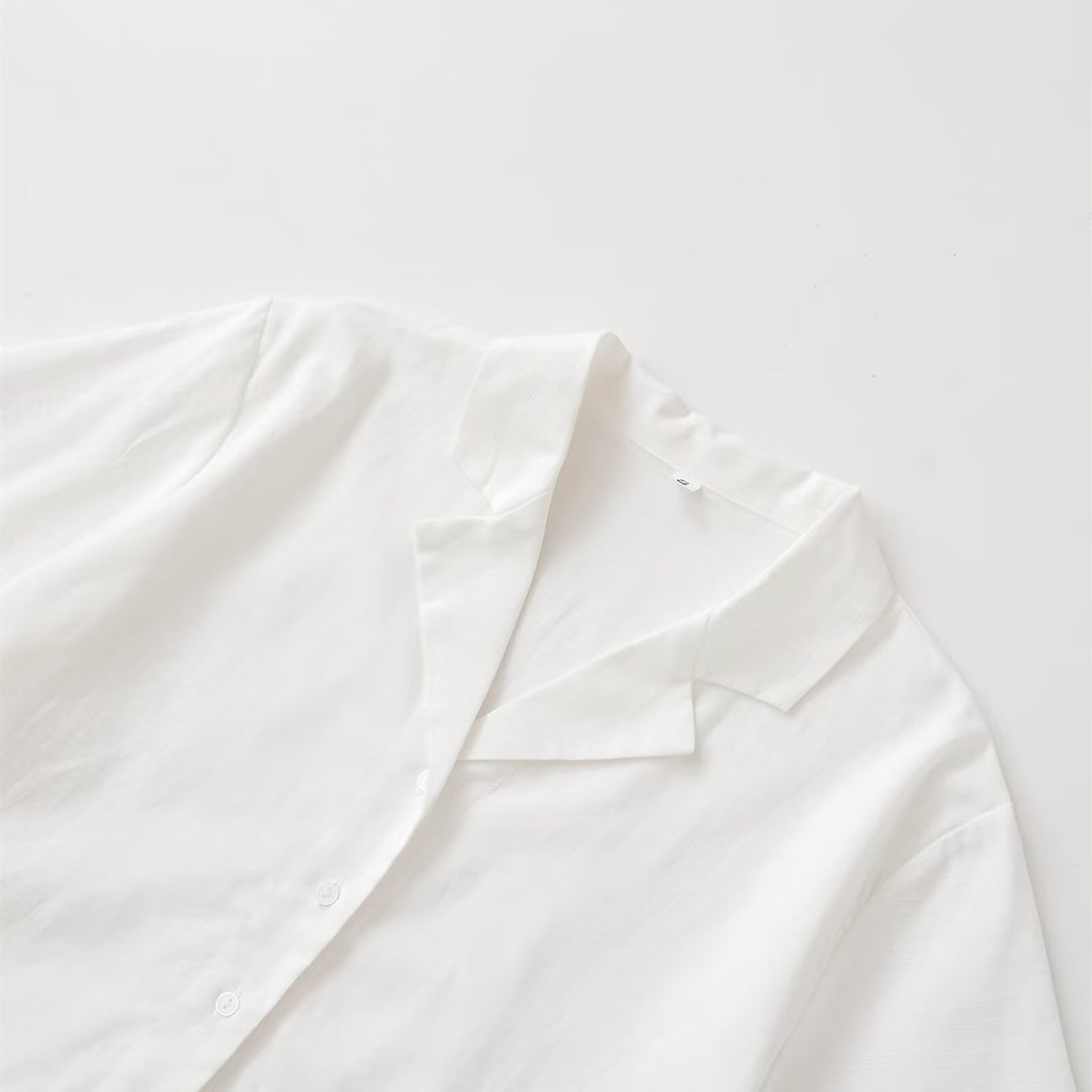 Damen kortärmad blus med elegant snitt och högkvalitativ satin yta Mirla-Eva Jonsson