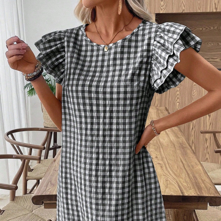 Damen kortärmad klänning i modern vichy-design med volangdetaljer Mirla-Eva Jonsson