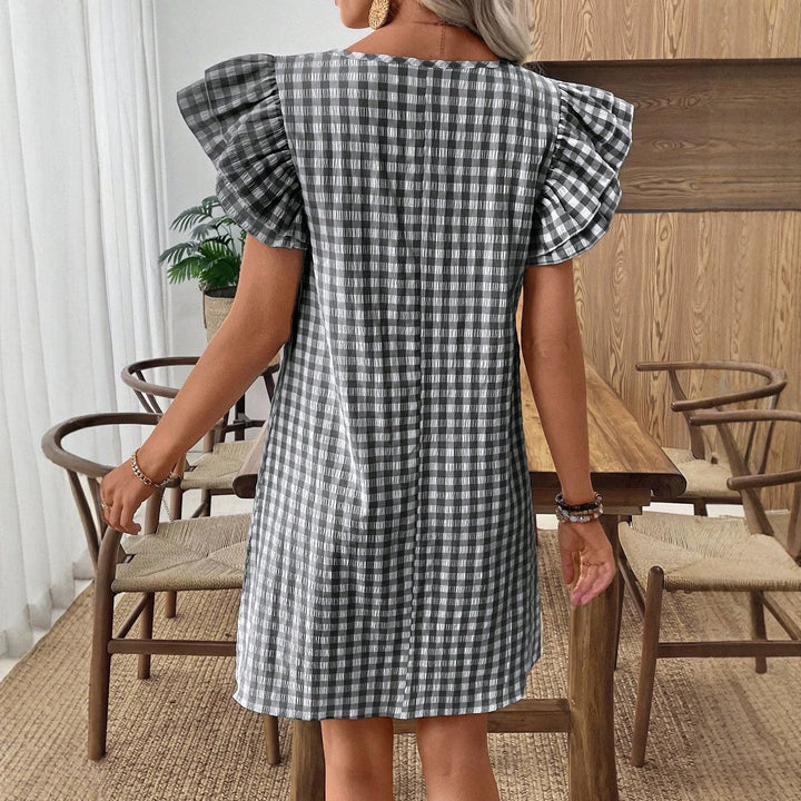 Damen kortärmad klänning i modern vichy-design med volangdetaljer Mirla-Eva Jonsson