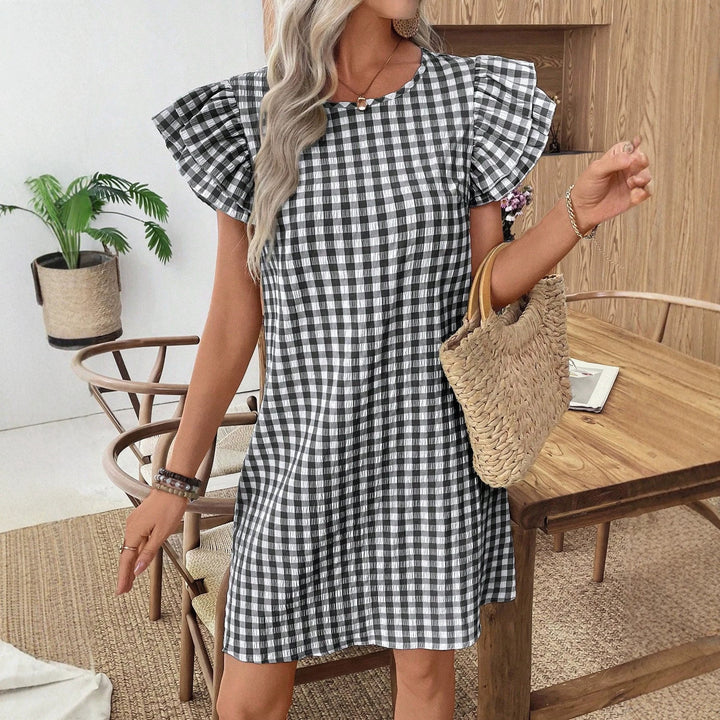 Damen kortärmad klänning i modern vichy-design med volangdetaljer Mirla-Eva Jonsson