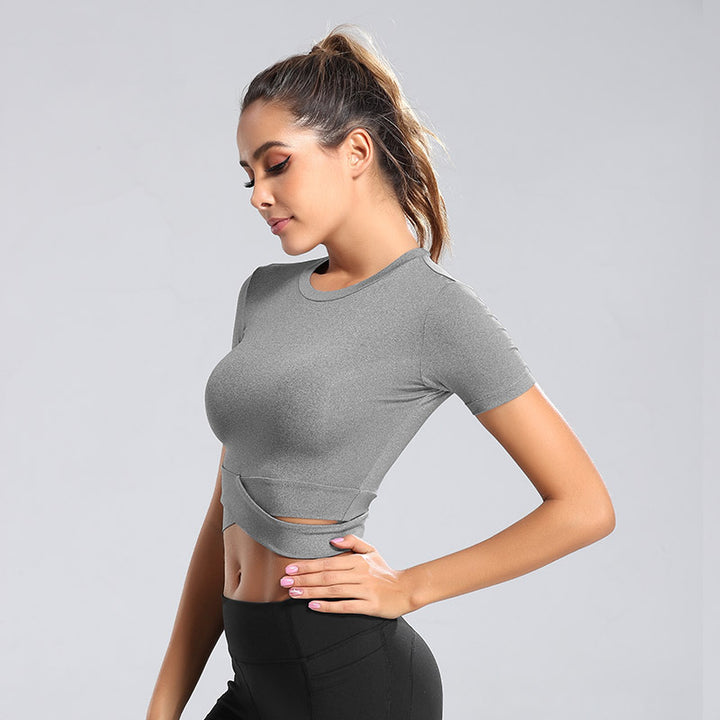 Damen kortärmad tränings-crop-top med innovativt omslagseffekt Mirla-Eva Jonsson
