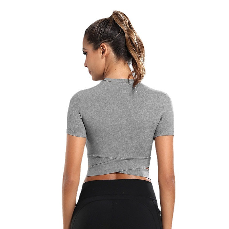 Damen kortärmad tränings-crop-top med innovativt omslagseffekt Mirla-Eva Jonsson