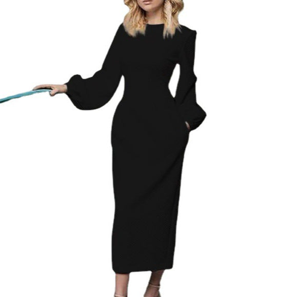 Damen maxikjol med eleganta puffärmar och figursydd skärning Mirla-Eva Jonsson