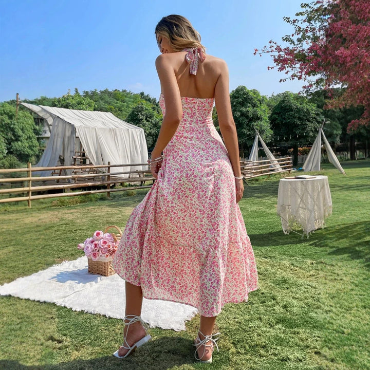 Damen maxiklänning med blommig design och rynkad fåll Mirla-Eva Jonsson