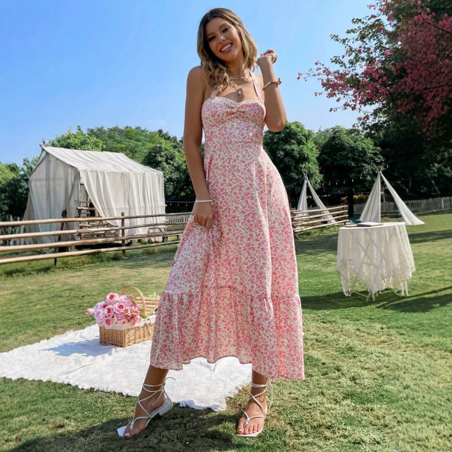 Damen maxiklänning med blommig design och rynkad fåll Mirla-Eva Jonsson