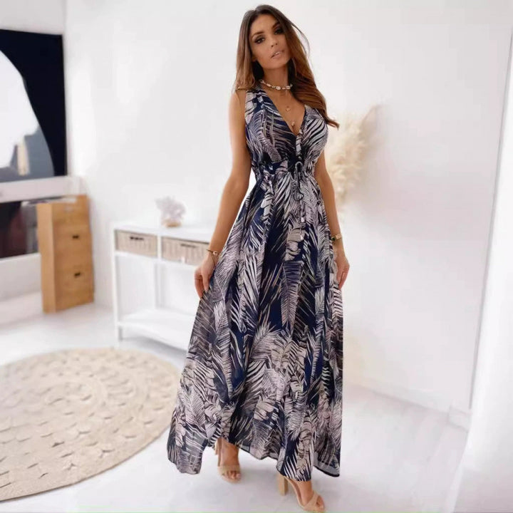 Damen maxiklänning med blommönster och figursydd överdel Mirla-Eva Jonsson