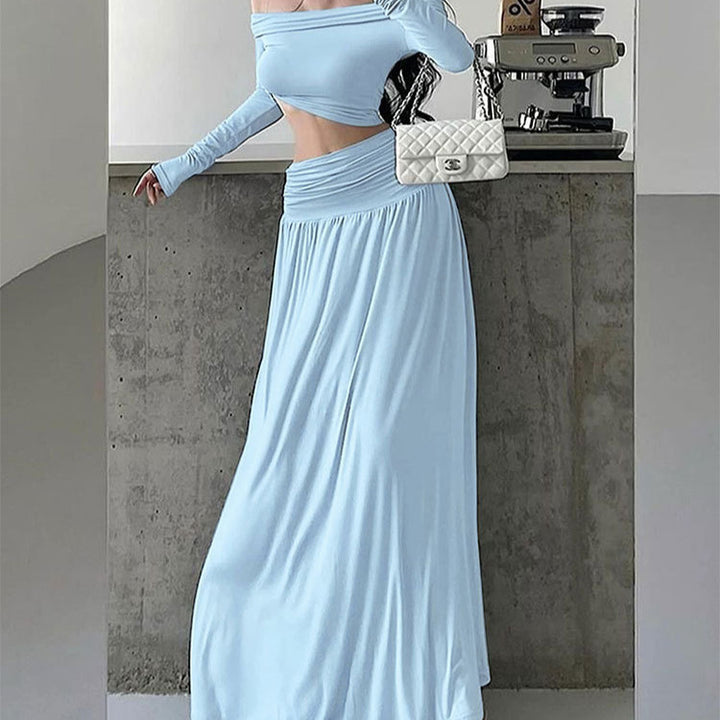 Damen maxiklänning med elegant rynkning och off-shoulder design Mirla-Eva Jonsson