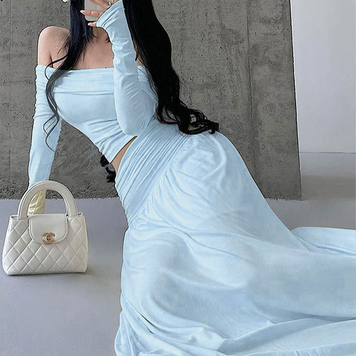 Damen maxiklänning med elegant rynkning och off-shoulder design Mirla-Eva Jonsson