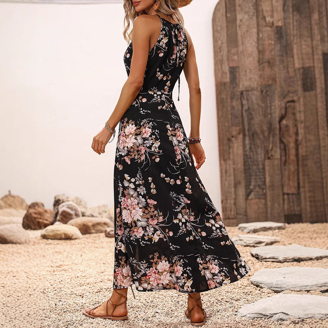 Damen maxiklänning med eleganta sidfickor och blommiga accenter Mirla-Eva Jonsson