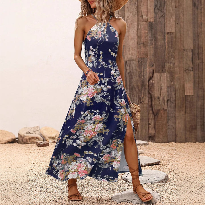Damen maxiklänning med eleganta sidfickor och blommiga accenter Mirla-Eva Jonsson
