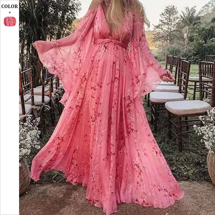 Damen maxiklänning med eleganta trumpetärmar och blommönstrat övermaterial Mirla-Eva Jonsson