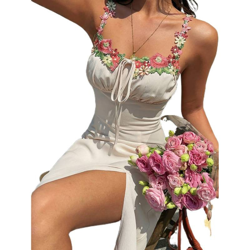 Damen maxiklänning med floral detalj och justerbar halsringning Mirla-Eva Jonsson