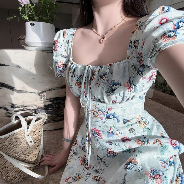 Damen maxiklänning med raffinerad blommönster och figursydd siluett Mirla-Eva Jonsson