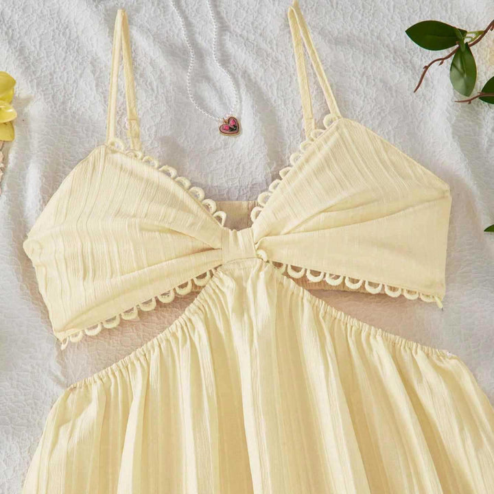 Damen maxikleid med ömtåliga volanger och justerbara spaghetti-remmar Mirla-Eva Jonsson