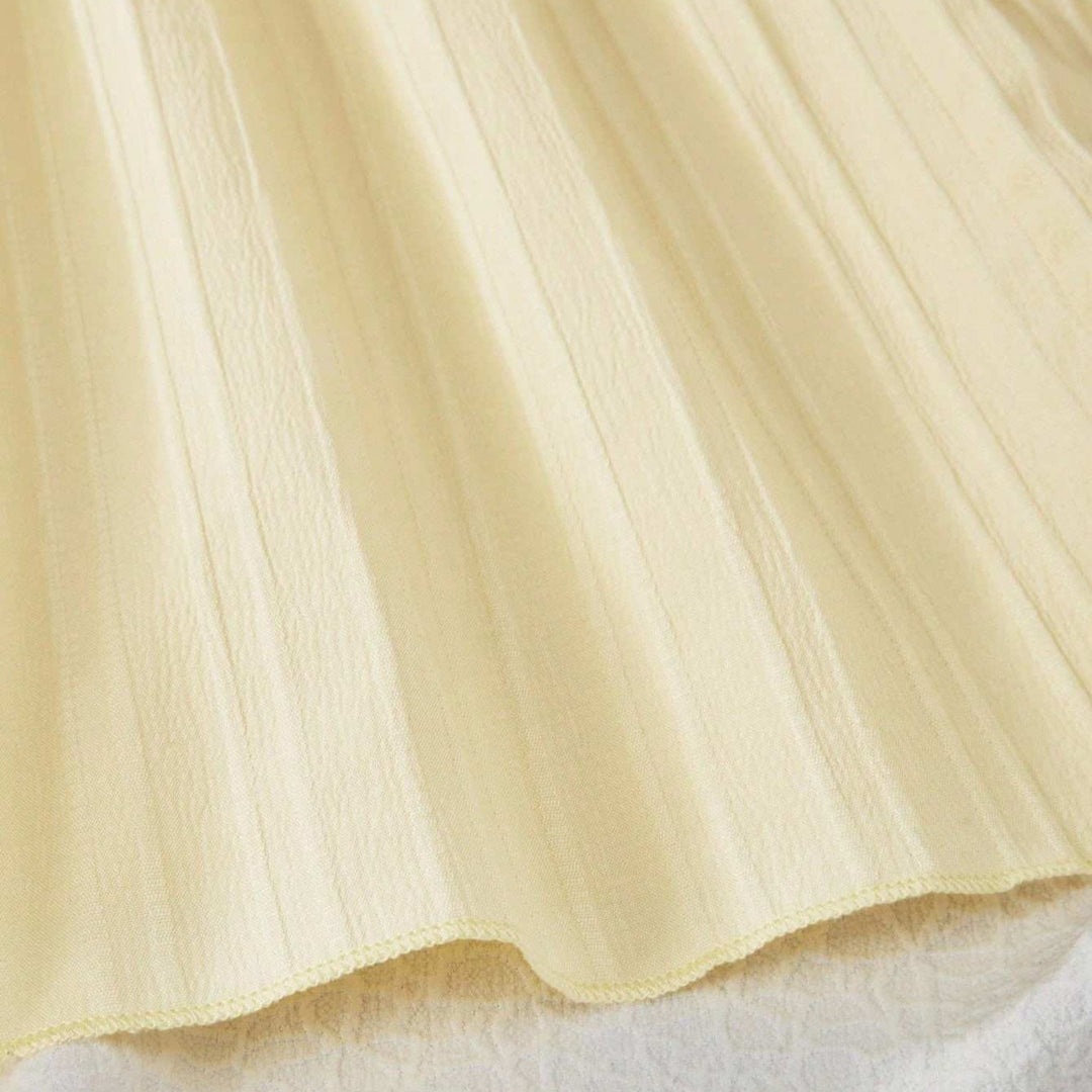Damen maxikleid med ömtåliga volanger och justerbara spaghetti-remmar Mirla-Eva Jonsson