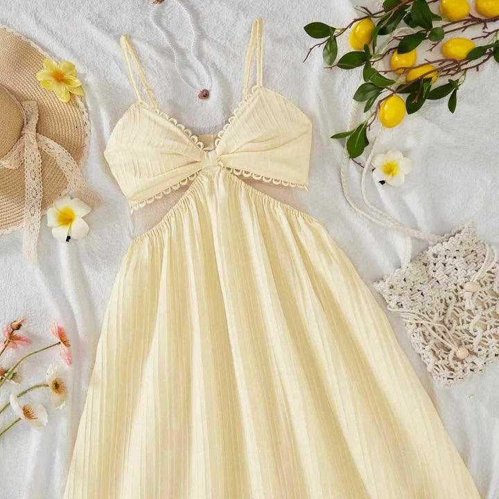 Damen maxikleid med ömtåliga volanger och justerbara spaghetti-remmar Mirla-Eva Jonsson