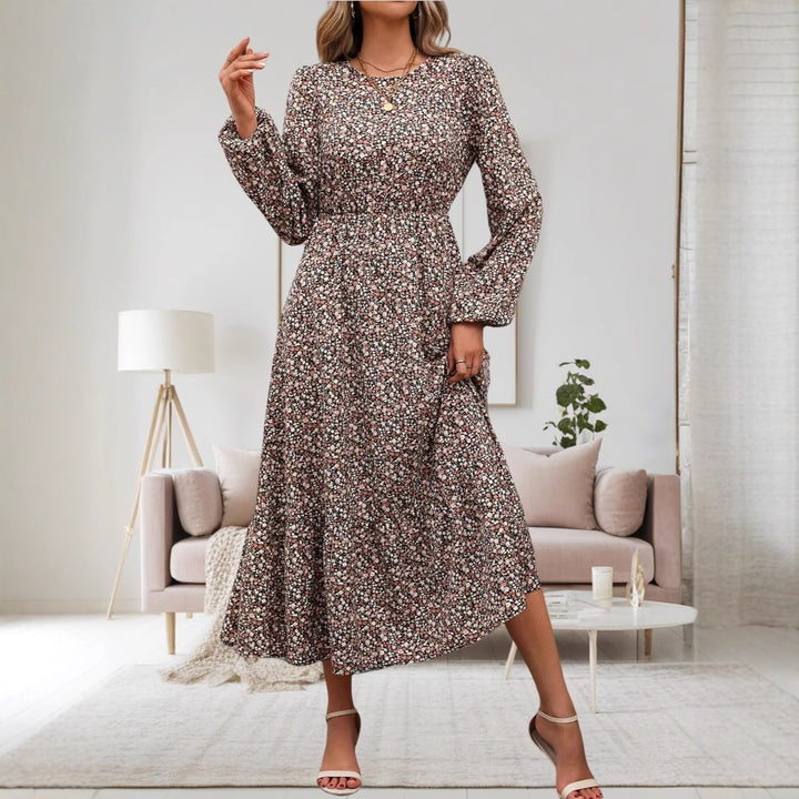 Damen midi-klänning med elastiskt midjeband och blommönster Mirla-Eva Jonsson