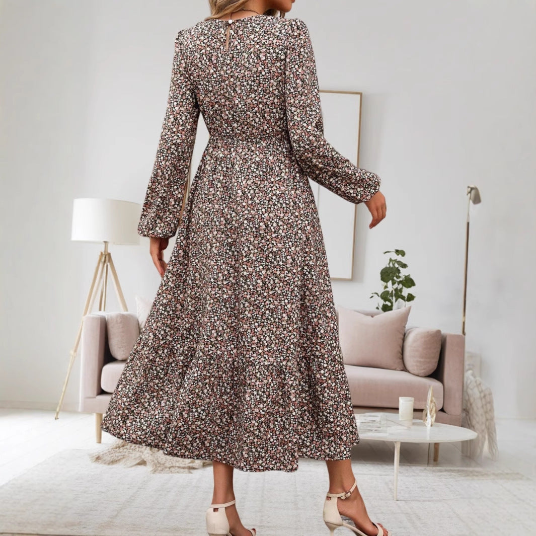 Damen midi-klänning med elastiskt midjeband och blommönster Mirla-Eva Jonsson