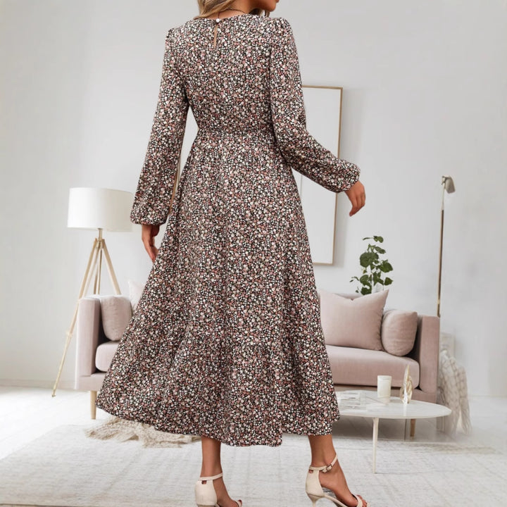 Damen midi-klänning med elastiskt midjeband och blommönster Mirla-Eva Jonsson
