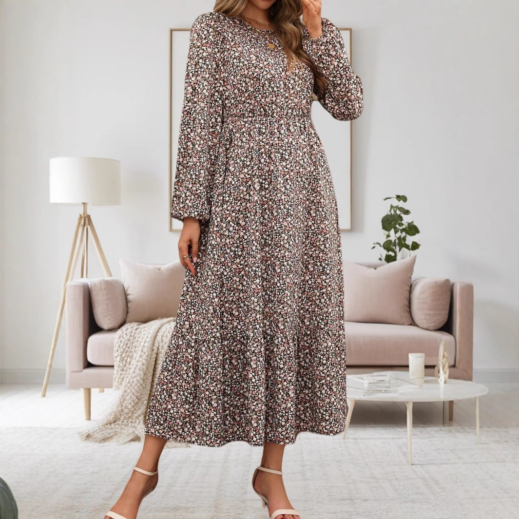 Damen midi-klänning med elastiskt midjeband och blommönster Mirla-Eva Jonsson