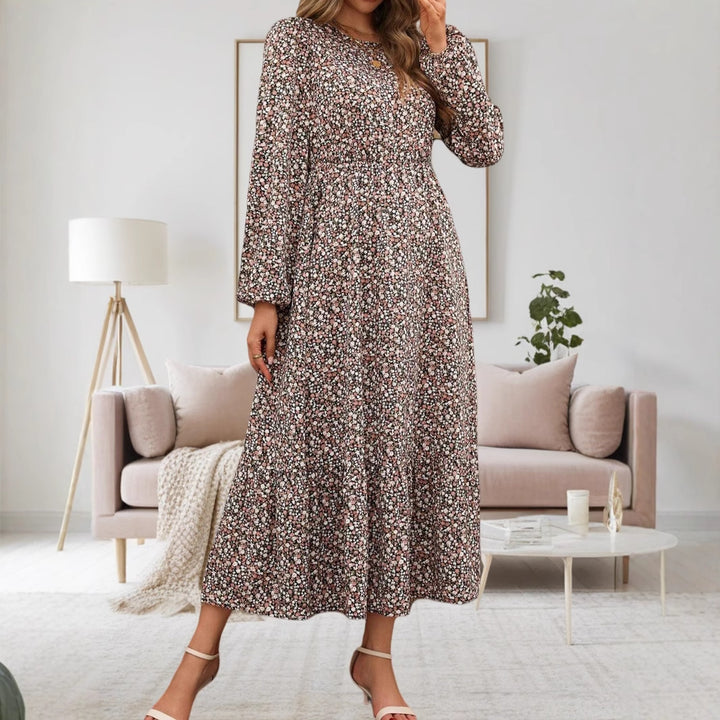 Damen midi-klänning med elastiskt midjeband och blommönster Mirla-Eva Jonsson