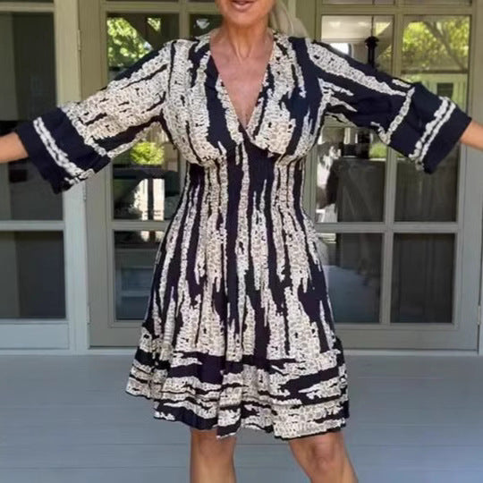 Damen midikjol med lekfullt mönster och eleganta 3/4-ärmar Mirla-Eva Jonsson