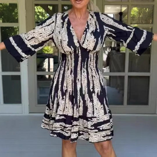 Damen midikjol med lekfullt mönster och eleganta 3/4-ärmar Mirla-Eva Jonsson